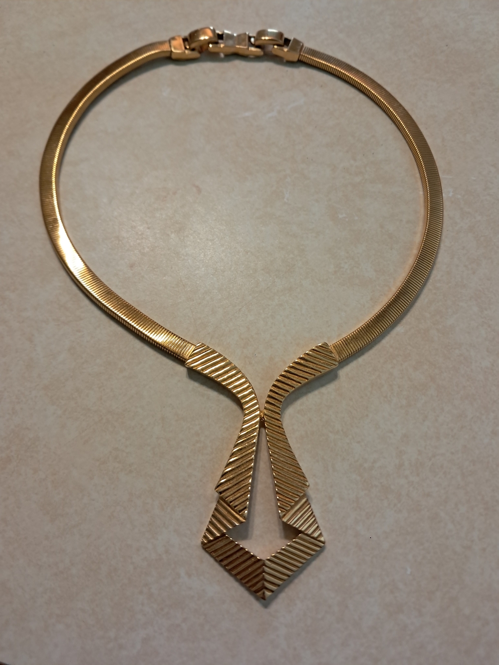 Vintage Trifari crown gold tone herringbone omega chain choker necklace with a s